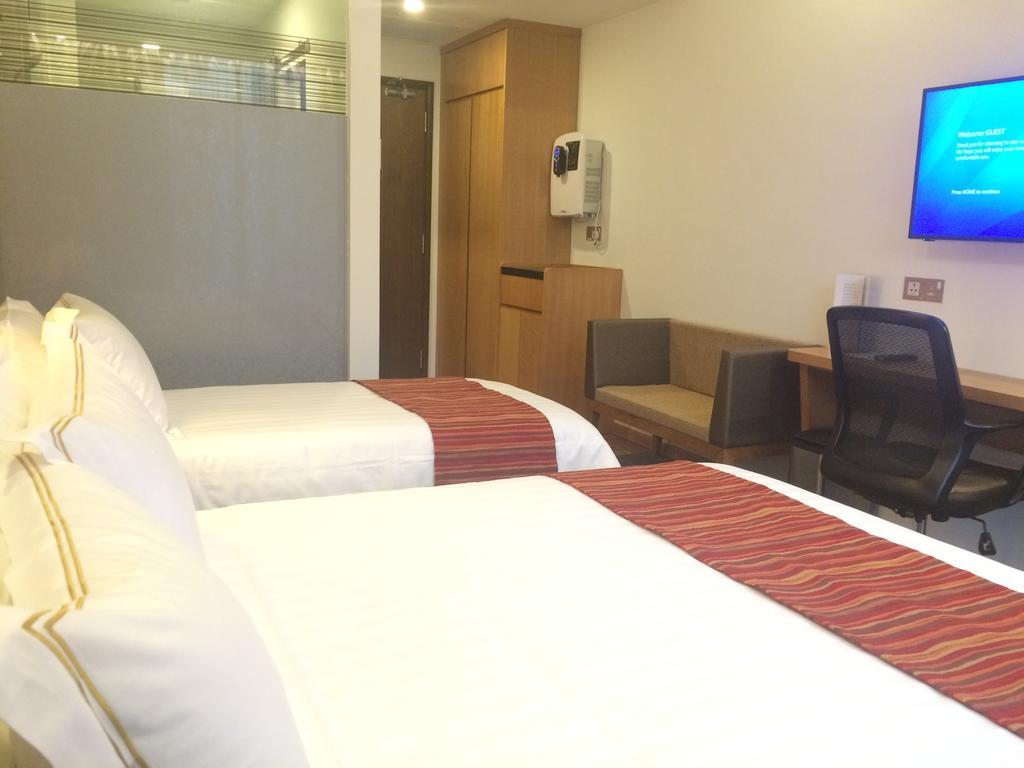 Hotel Grand Central Singapore Room photo